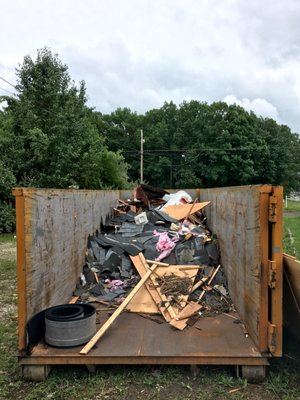 The door on the dumpsters folds completely out of the way allowing users to load them from the front to the back efficiently.