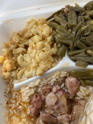 Mac and cheese, green beans with a side of rice and pig feet.