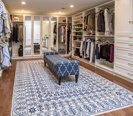 Custom closet design with an open floor plan. We do custom storage solutions that are custom to your storage needs and design desire.