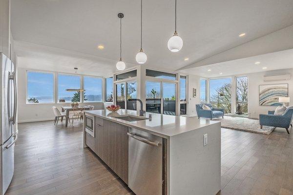 Exquisite new construction with stunning 180 degree Lake Washington views.