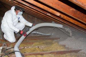 Blowing cellulose insulation into an attic