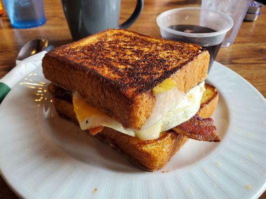 French Toast Sandwich with bacon, egg and Swiss cheese