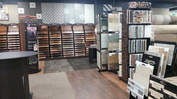 Wood, Laminate, Stone, Tile, Vinyl plank, Carpet, Travertine. If we don't stock it we can order it for you.