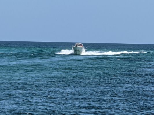 Powerboat coming in to Boca Inlet