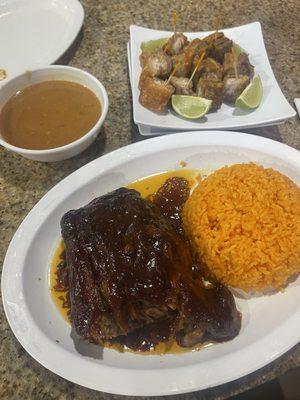 Barbecue ribs yellow rice and Chicharron