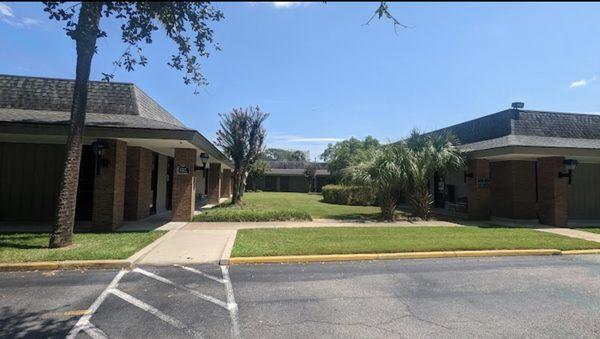 Courtyard in back of Myrtle Offices Professional Complex. Massage suite located by taking sidewalk on the left.