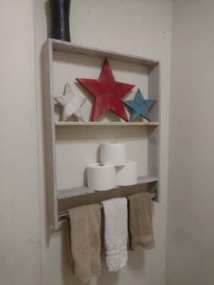 Handmade white washed towel bar with shelves. Perfect for a bathroom.