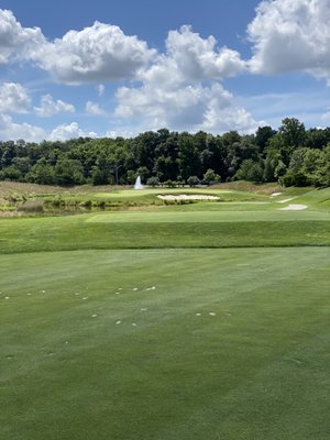 Par 3 Down the hill and over water. Beautiful but brutal hile