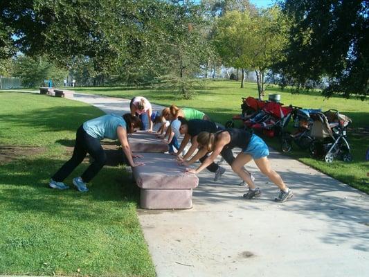 Fit 4 Moms stay fit doing mountain climbers.