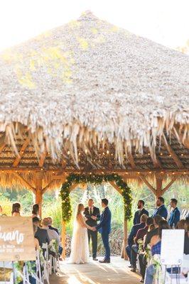 Palapa ceremony with our custom-built arbor.  Add your own decorations or use ours!