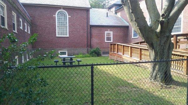 Shining Stars outdoor courtyard and play area