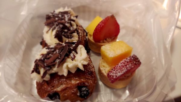 Mini chocolate croissant and mini fruit tart. This was the servings for 2 people.