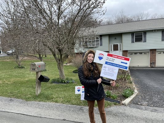 Chelsea Sipperly, Licensed Real Estate Salesperson setting up for an open house.