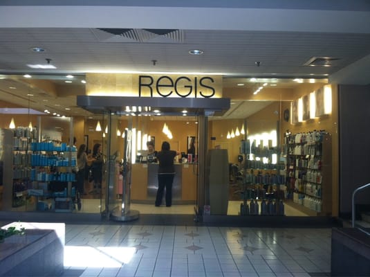 Store front located down toward the food court adjacent to the theatre.