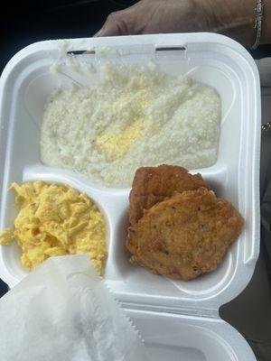 Salmon patties , cheese eggs and grits