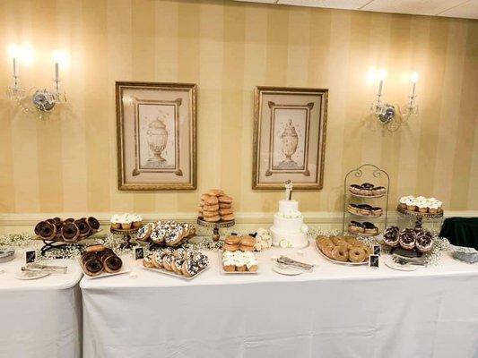 The donut desert table of our dreams!-set up by the staff. We literally dropped off a bunch of donuts and cake and they set up everything!