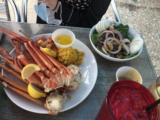 Crab legs and spinach salad