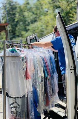 Loading our Van to deliver customers clothes.