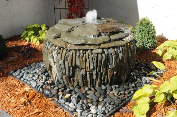 traditionally laid drystone outdoor water feature 
materials-bluestone