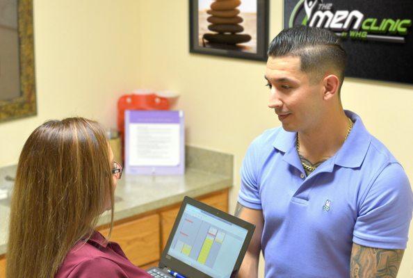 Specialist Jessica assisting a patient