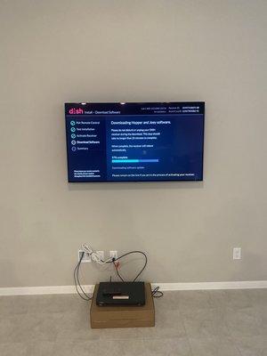 Mount the TV on the wall. Put in power relocate and cable pass through To hide all the wires. Customer did not have a TV stand yet