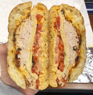 P1: Turkey breast panini, with swiss cheese, bacon, tomatoes, roasted peppers, and russian dressing ($6.99).