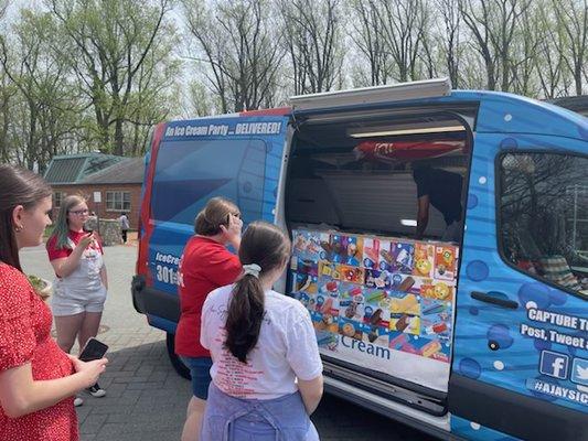 People waiting in line to purchase my many different ice cream options