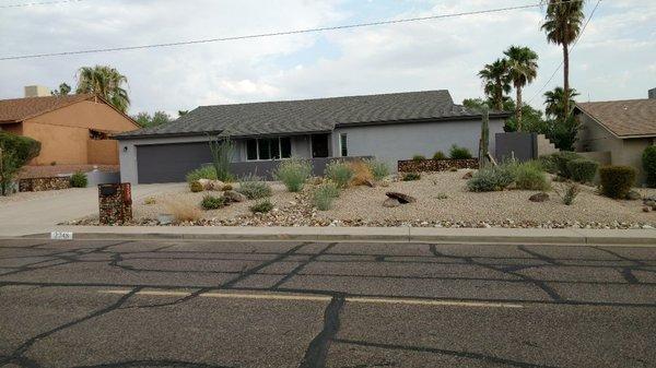 Front yard renovation with custom gabion planters and mailbox.