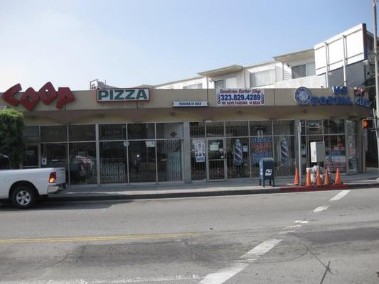 Right next to The Coop Pizza & Bob's Market, where National Blvd, Palms Ave and Exposition Blvd meet.