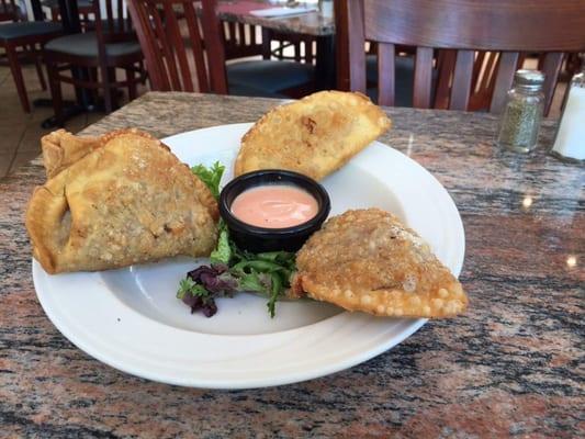 House Made Empanadas- Cuban, Picadillo, Chicken, Three Cheese and Spinach with goat cheese.