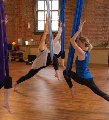 Trying Aerial Yoga.