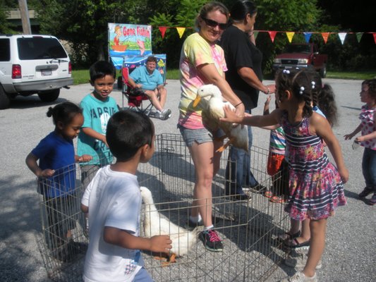 Summer program - a patting-zoo comes to center