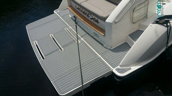 New Seadek decking installed on Current Sea.  Seadek is soft, cool, and non skid.  It's also very easy to clean!