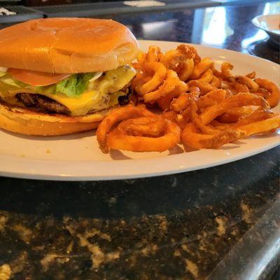 OG Smashburger with lettuce, tomatoes, raw onion and special sauce.