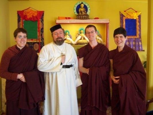 Our founders with a Christian priest during an interfaith series we hosted