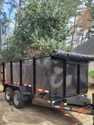 Driveway friendly dumpsters with real wheels that won't damage your driveway