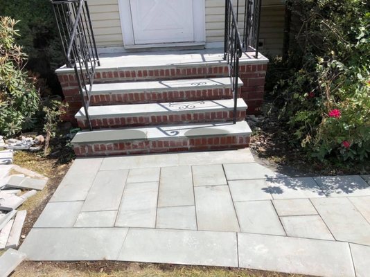 We decided to replace with this beautiful finish including a new walkway!