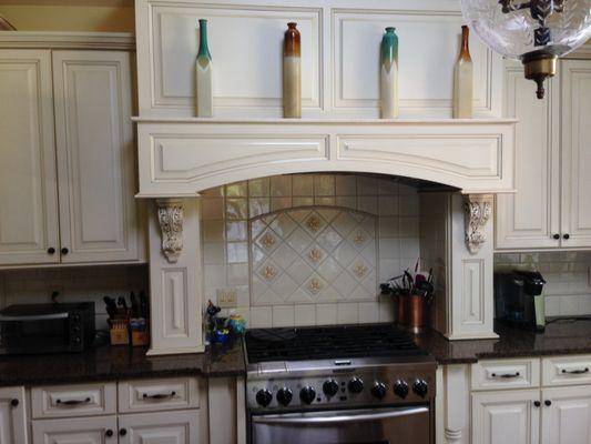 Tropical Brown granite counter top with Beautiful White/Gold tiled backsplash 1/6