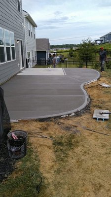 560 sq ft curved patio addition we installed.