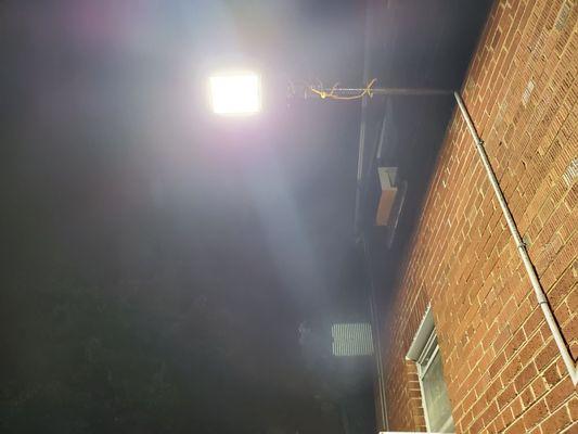 200 watt LED security light installed above customers driveway turns night into day