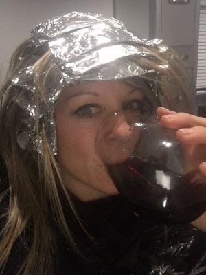 Enjoy a glass of wine while getting your hair done ‍