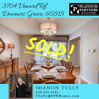 Happy clients completing a successful  sale of their staged home in Downers Grove!