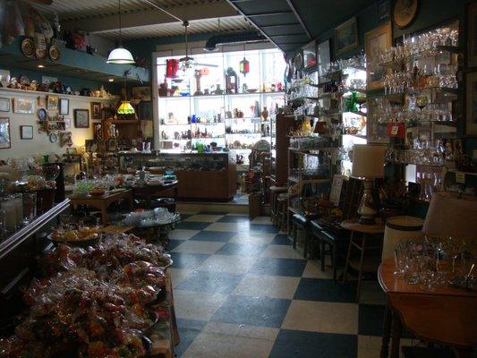 View towards the front window, checkout desk and mystery candy on the left.