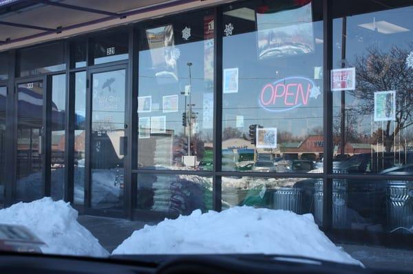 The storefront, with window.