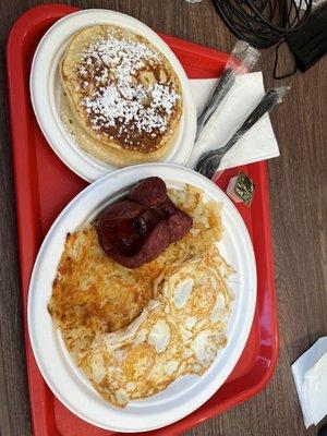 Two eggs with Beef Sausage, hash browns & a side of pancakes