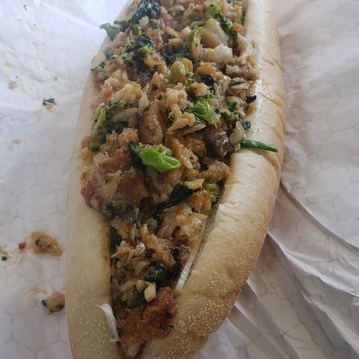 Whiting steak with broccoli, spinach, and onions