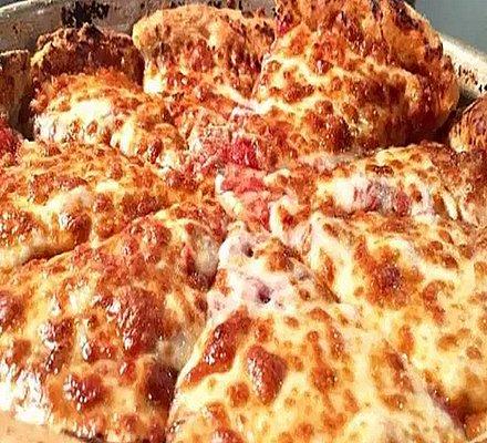 Classic Cheese Pizza... Our famous handmade crust ladled with our Signature Sauce topped with a generous amount of Mozzarella cheese.