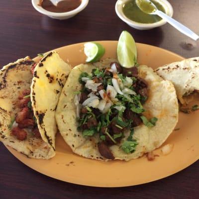 Bistec and al pastor tacos