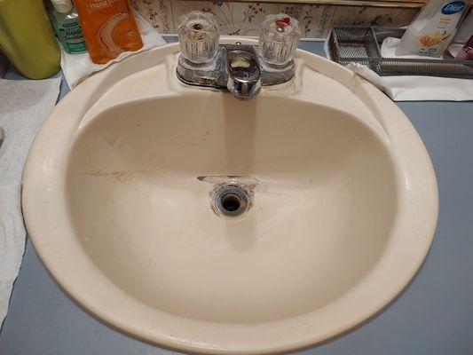 Old plastic bathroom sink