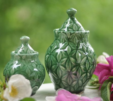 Handmade Porcelain Urns that are Garden Inspired.